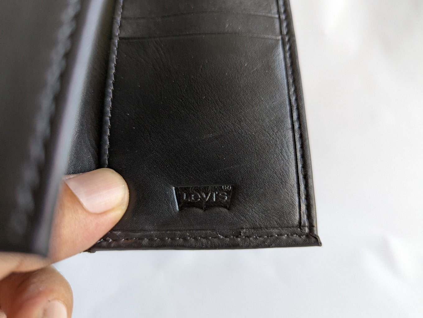 Lids UNLV Rebels Fossil Leather Ryan RFID Flip ID Bifold Wallet |  CoolSprings Galleria